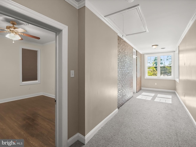 13 N Allegany St, Cumberland, MD 21502 - corridor with attic access, baseboards, ornamental molding, and brick wall