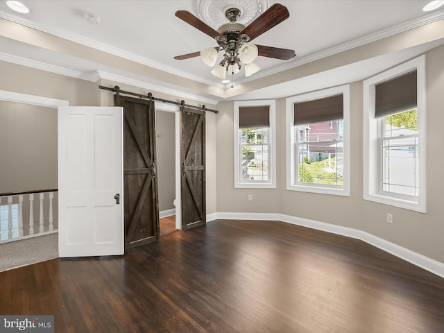 13 N Allegany St, Cumberland, MD 21502 - unfurnished bedroom featuring a barn door, wood finished floors, baseboards, and crown molding