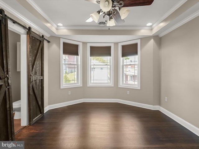 13 N Allegany St, Cumberland, MD 21502 - unfurnished room with a barn door, wood finished floors, ceiling fan, crown molding, and baseboards