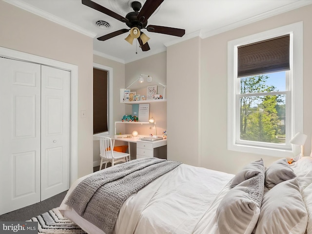 13 N Allegany St, Cumberland, MD 21502 - bedroom with ornamental molding, a ceiling fan, and a closet