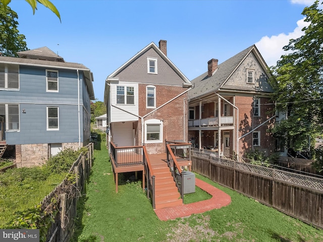 13 N Allegany St, Cumberland, MD 21502 - back of property featuring stairs, a deck, and a chimney