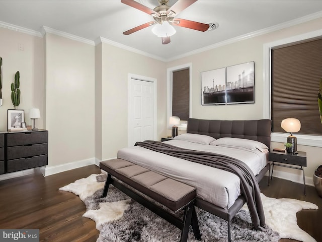 13 N Allegany St, Cumberland, MD 21502 - bedroom with dark wood-style flooring, crown molding, baseboards, and ceiling fan