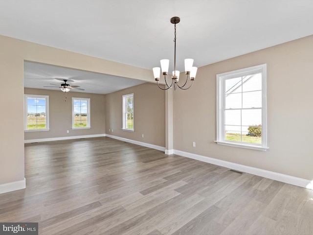 200 School Rd, Bethel, DE 19931 - unfurnished room featuring wood finished floors, an inviting chandelier, baseboards, and visible vents