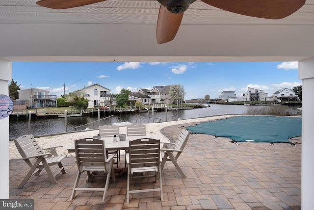 33 W Delaware Dr, Little Egg Harbor Twp, NJ 08087 - view of patio / terrace with a residential view, outdoor dining area, and a water view