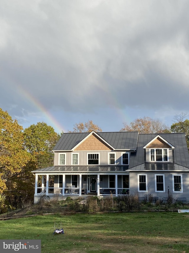 173 Puffball Rd, Hedgesville, WV 25427 - rear view of property featuring metal roof, a lawn, covered porch, and a standing seam roof