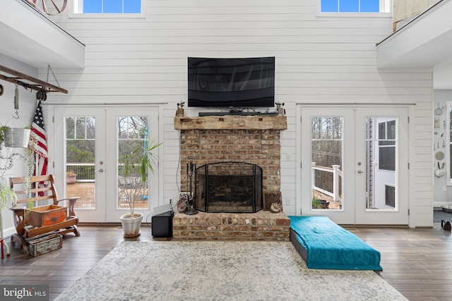 173 Puffball Rd, Hedgesville, WV 25427 - living room with french doors, a towering ceiling, and hardwood / wood-style flooring