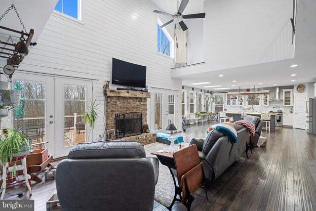 173 Puffball Rd, Hedgesville, WV 25427 - living area with french doors, ceiling fan, a high ceiling, and dark wood finished floors