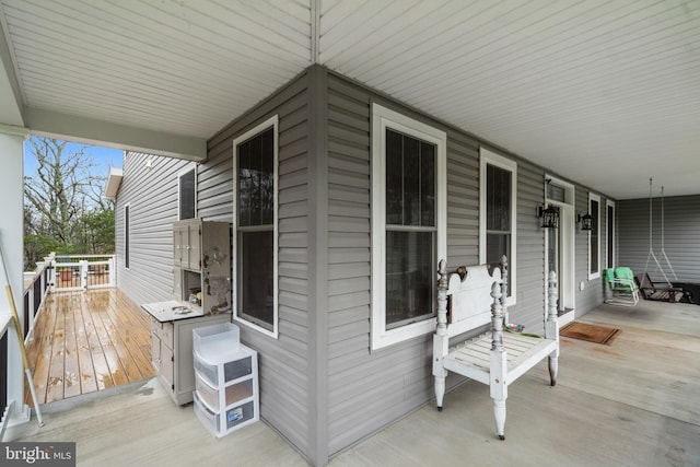 173 Puffball Rd, Hedgesville, WV 25427 - wooden deck with covered porch