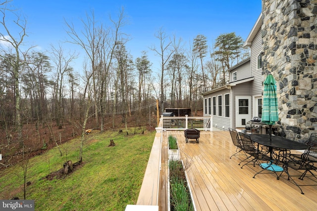 173 Puffball Rd, Hedgesville, WV 25427 - deck with a grill, outdoor dining space, and a lawn