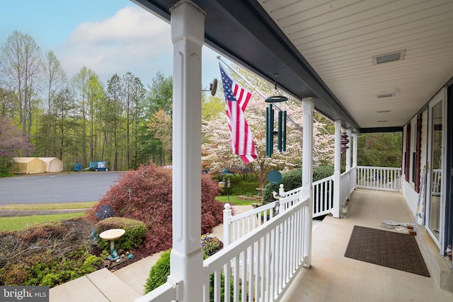view of patio featuring a porch