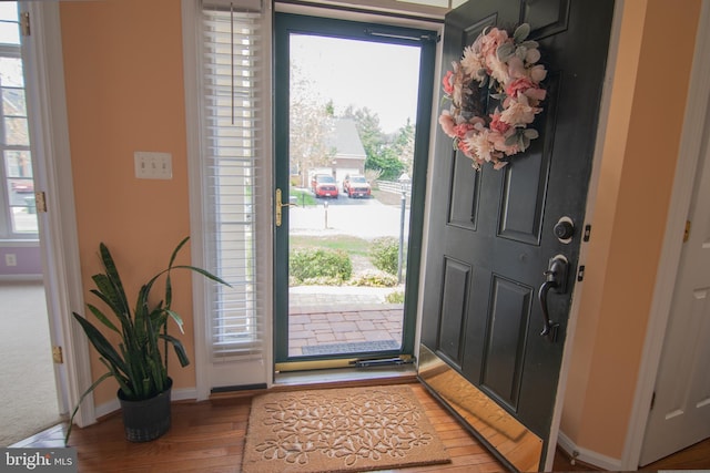 12253 Tulane Falls Dr, Bristow, VA 20136 - foyer with light wood-style flooring and baseboards