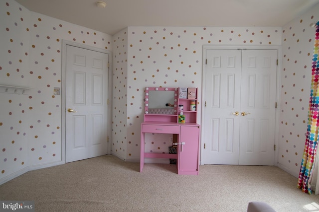 12253 Tulane Falls Dr, Bristow, VA 20136 - recreation room featuring wallpapered walls and carpet floors
