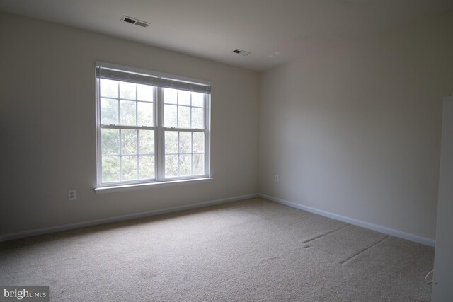 12253 Tulane Falls Dr, Bristow, VA 20136 - carpeted spare room featuring baseboards and visible vents