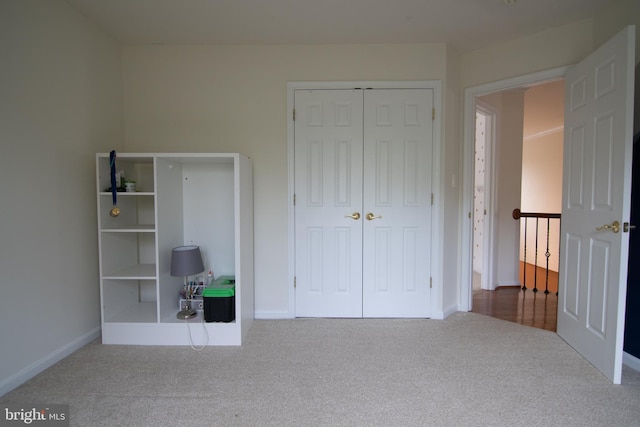 12253 Tulane Falls Dr, Bristow, VA 20136 - unfurnished bedroom featuring baseboards, carpet floors, and a closet