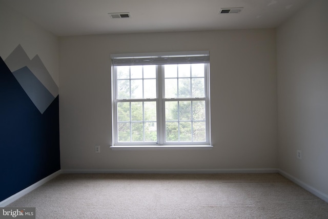 12253 Tulane Falls Dr, Bristow, VA 20136 - unfurnished room with baseboards, visible vents, and carpet floors