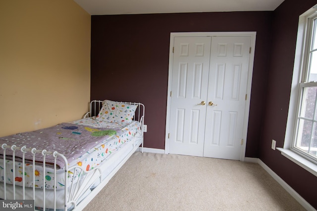 12253 Tulane Falls Dr, Bristow, VA 20136 - carpeted bedroom with baseboards and a closet