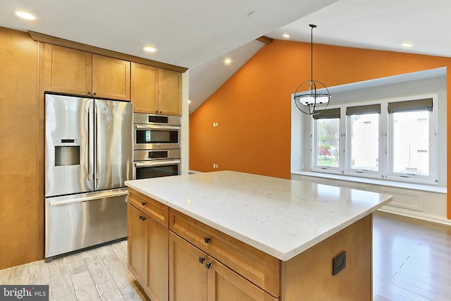 kitchen featuring stainless steel appliances, light wood-type flooring, vaulted ceiling, and light stone counters