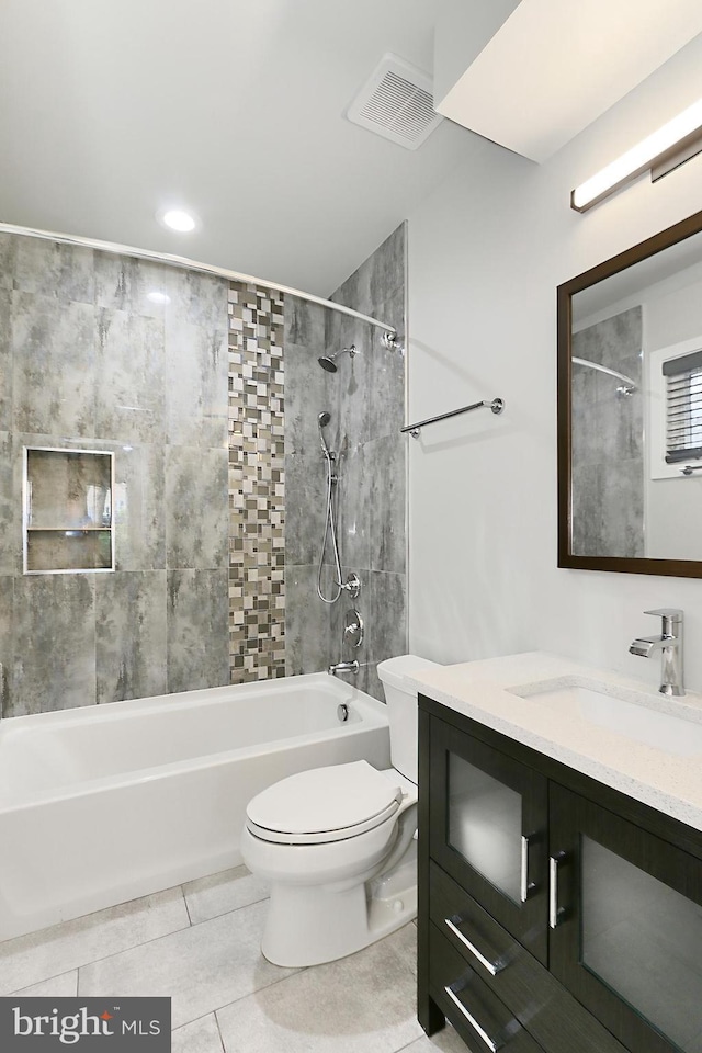 full bathroom featuring vanity, tile patterned flooring, shower / tub combination, toilet, and visible vents