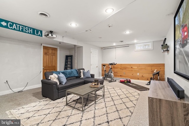 living area featuring visible vents, baseboards, recessed lighting, and carpet