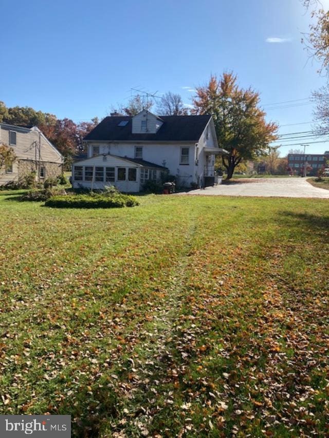 exterior space with a yard