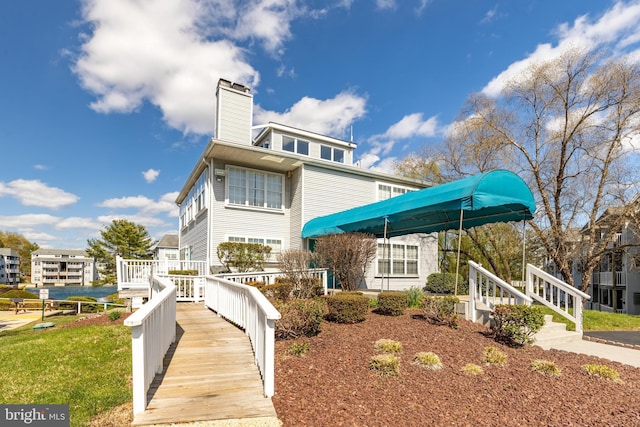 exterior space featuring a chimney