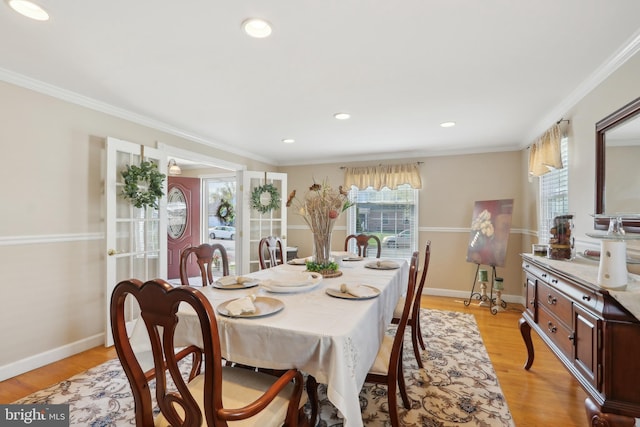 733 Cotswold Rd, Somerdale, NJ 08083 - dining space with light wood-style flooring, baseboards, and ornamental molding