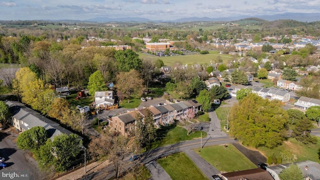 aerial view featuring a mountain view and a residential view