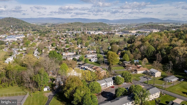 drone / aerial view featuring a mountain view and a residential view