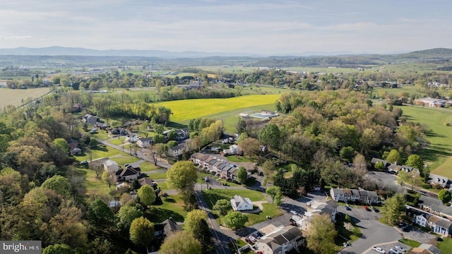 drone / aerial view featuring a mountain view