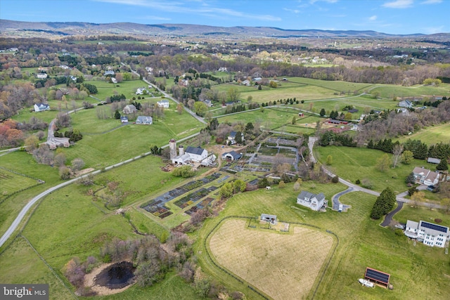 drone / aerial view featuring a mountain view