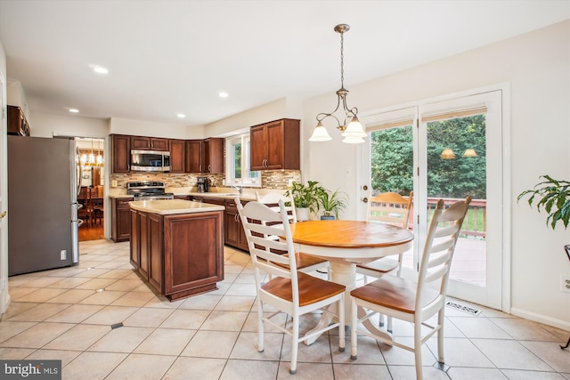 3430 Valewood Dr, Oakton, VA 22124 - dining room featuring light tile patterned flooring, a healthy amount of sunlight, an inviting chandelier, and recessed lighting