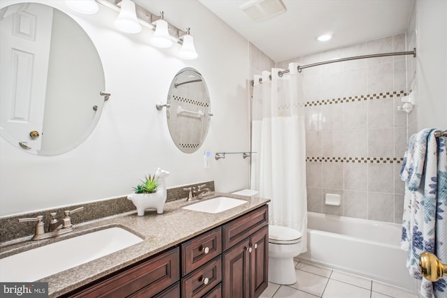 3430 Valewood Dr, Oakton, VA 22124 - full bathroom with tile patterned floors, shower / bath combo with shower curtain, a sink, and visible vents