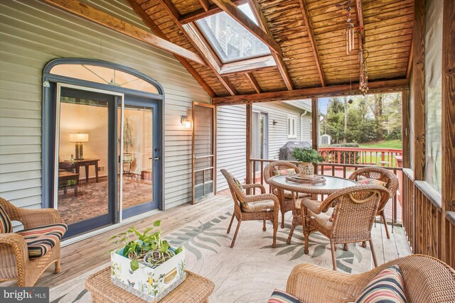 3430 Valewood Dr, Oakton, VA 22124 - sunroom with beamed ceiling and a skylight