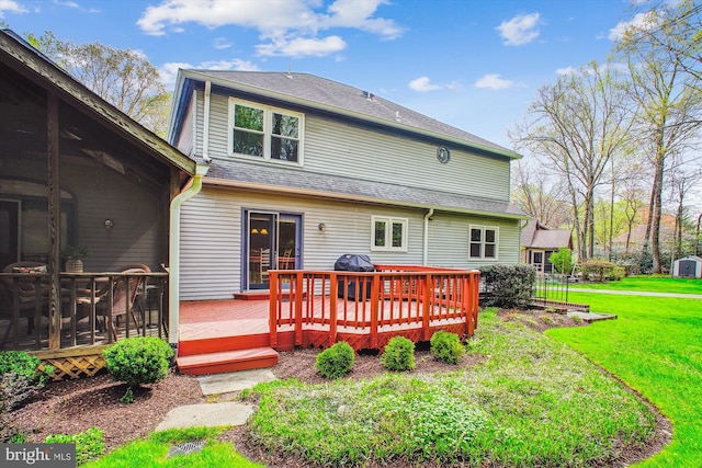 3430 Valewood Dr, Oakton, VA 22124 - rear view of property with a sunroom, a yard, and a wooden deck