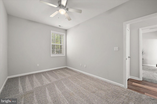 2 Rabbit Run Ln, Ocean Pines, MD 21811 - spare room featuring visible vents, a ceiling fan, carpet flooring, and baseboards