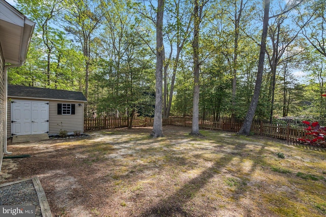 2 Rabbit Run Ln, Ocean Pines, MD 21811 - view of yard with an outdoor structure, a storage shed, and a fenced backyard