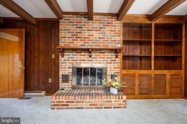 unfurnished living room featuring wooden walls, beamed ceiling, baseboard heating, and carpet flooring