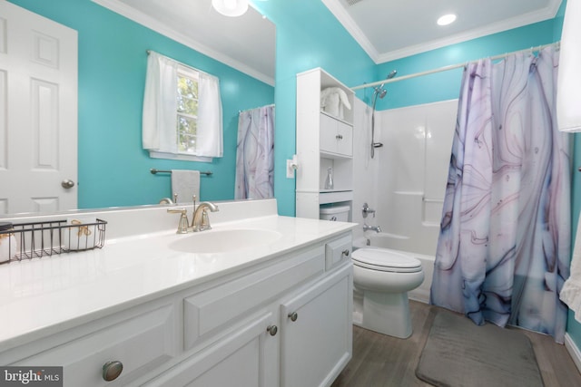 full bath featuring wood finished floors, vanity, toilet, ornamental molding, and shower / bath combo with shower curtain