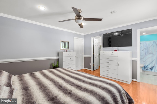 bedroom featuring recessed lighting, light wood finished floors, ornamental molding, baseboards, and ensuite bathroom