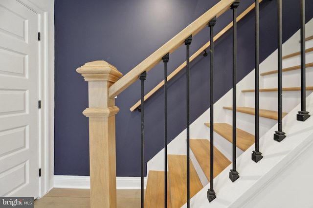 stairway with baseboards