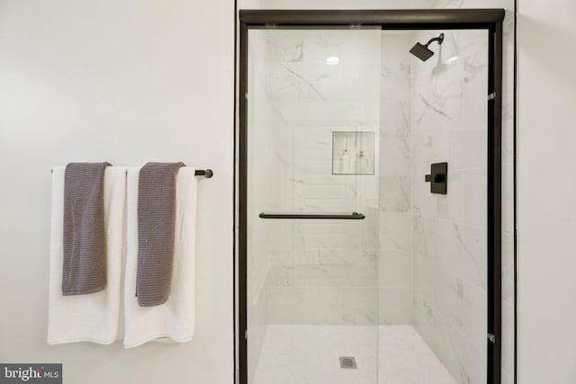 bathroom featuring a stall shower