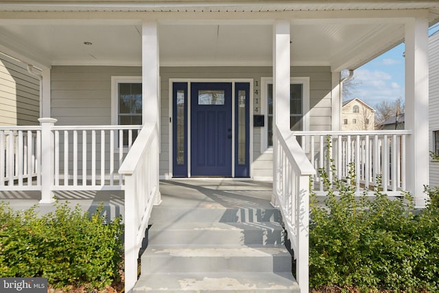 property entrance featuring covered porch