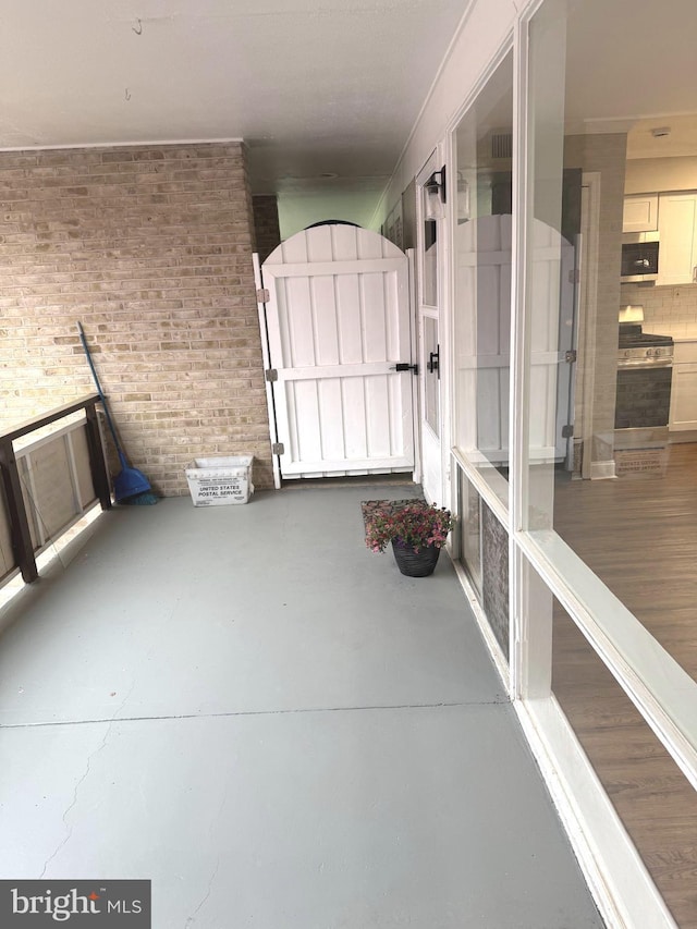 7553 Spring Lake Dr Unit 7553-D, Bethesda, MD 20817 - view of patio with a gate