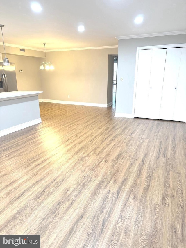 7553 Spring Lake Dr Unit 7553-D, Bethesda, MD 20817 - unfurnished living room with crown molding, baseboards, recessed lighting, and wood finished floors
