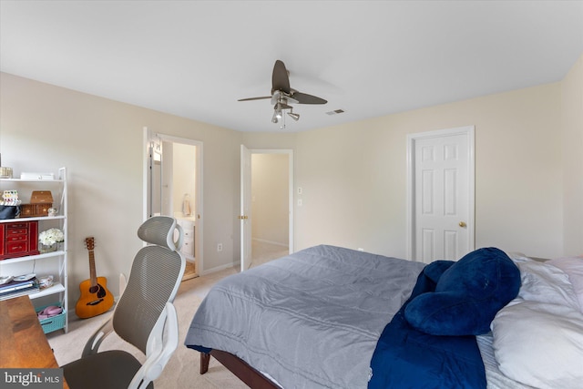bedroom featuring a ceiling fan, visible vents, light colored carpet, and baseboards