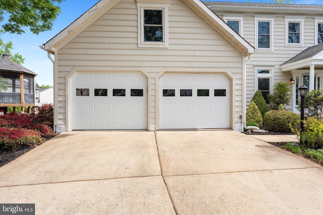 view of front of house with driveway and a garage