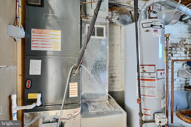 utility room with water heater and heating unit