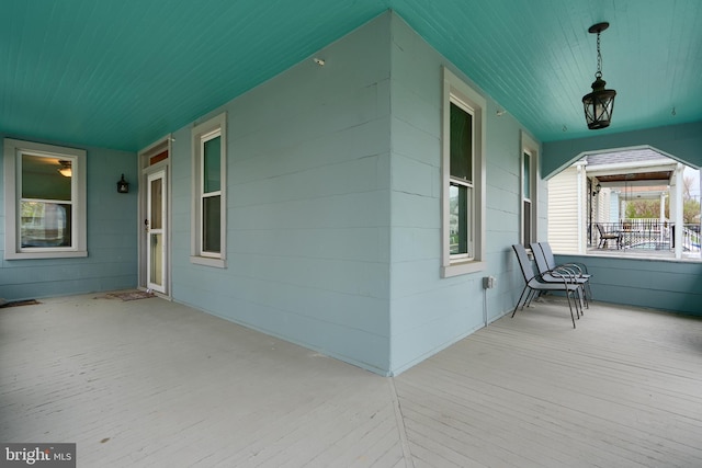view of side of home featuring a porch
