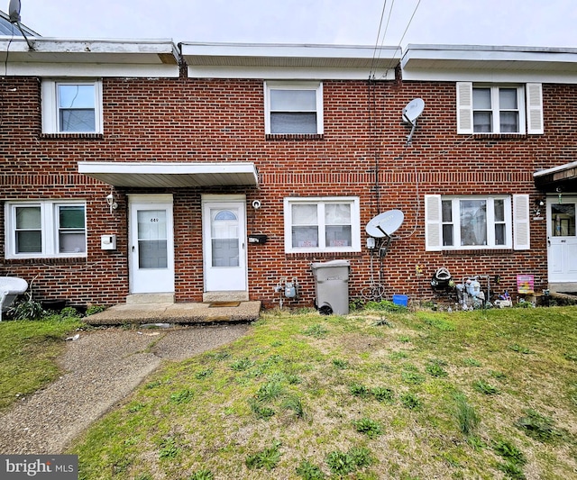 4471/2 Cook Ave, Paulsboro, NJ 08066 - townhome / multi-family property with brick siding and a front lawn