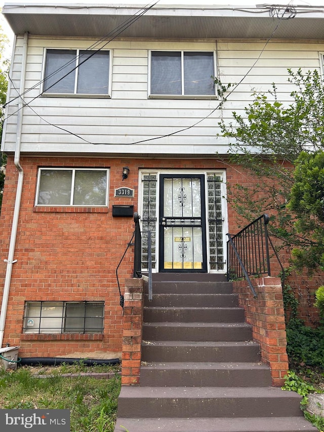 multi unit property featuring brick siding